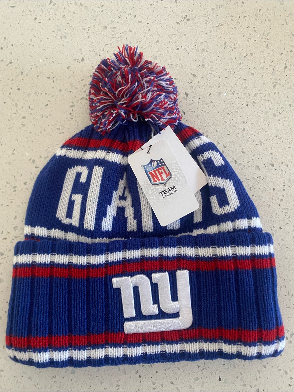 Giants 2024 Sideline Royal Blue Pom
Cuffed Knit Beanie Hat